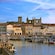 A harbor with boats and European style architecture